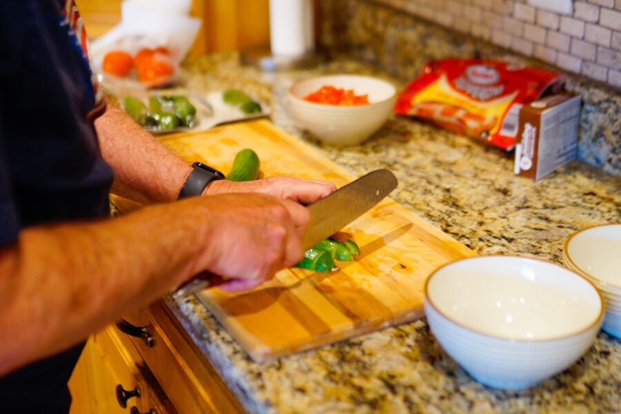 Kitchen counter vegetables cutting board meal prep