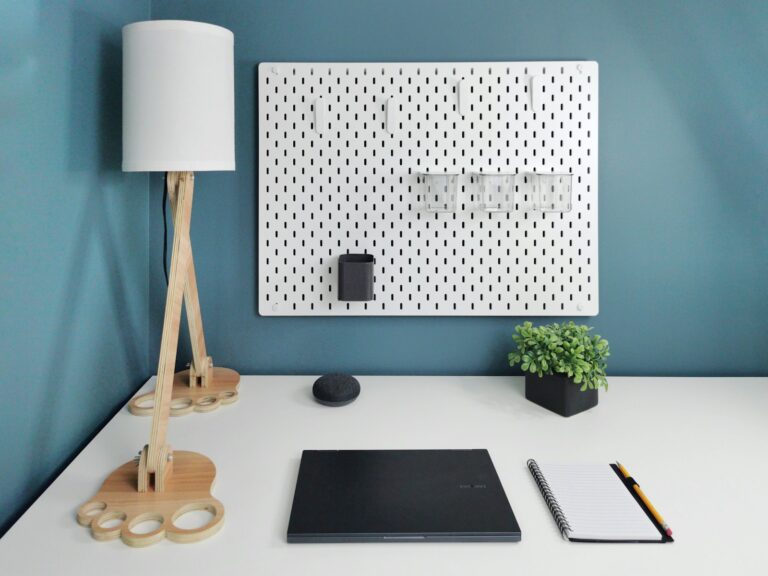 Pegboard wall above desk storage