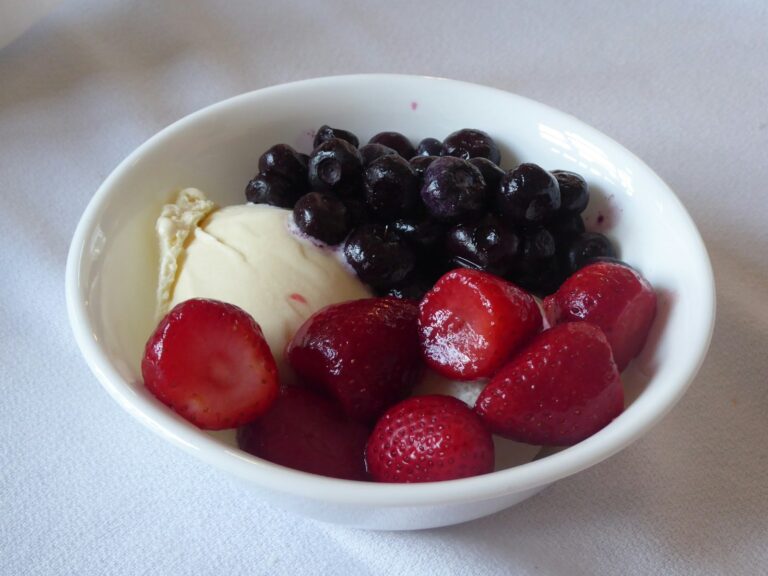 Frozen yogurt soft serve bowl berries cheesecake yogurt