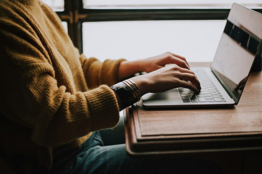 Person deleting online accounts laptop