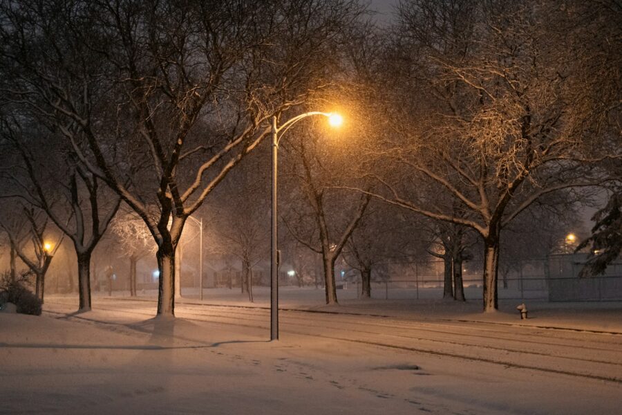 Snowy european city street lights