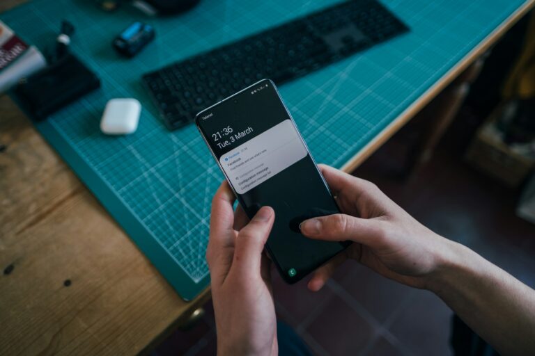 Person adjusting phone notification settings