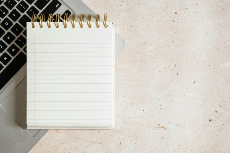 Person laptop digital notes notebook