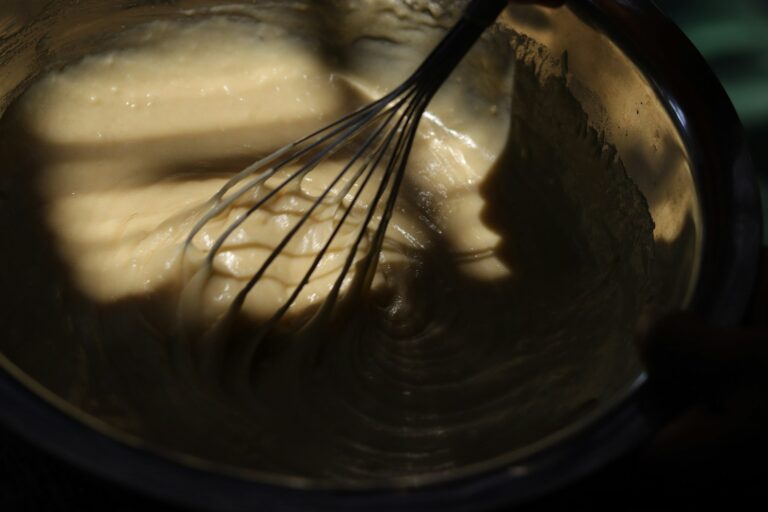Mixing muffin batter bowl whisk ingredients