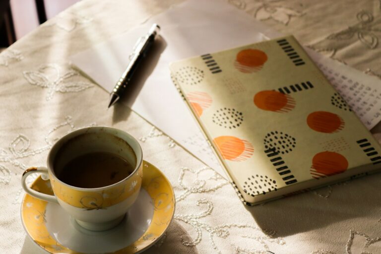 Evening desk cup tea notebook