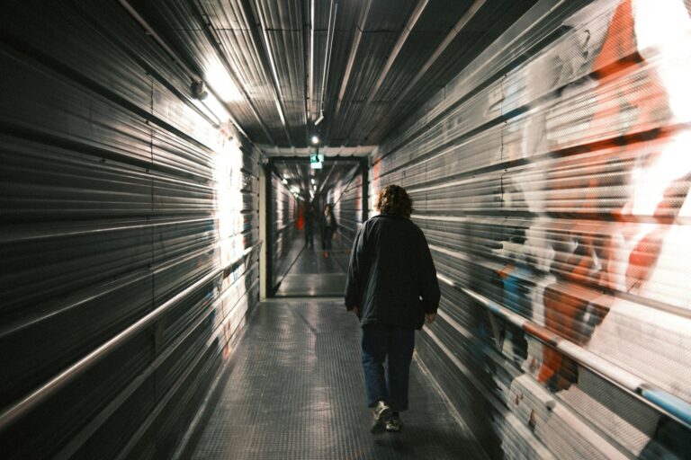 Person walking hallway taking short break