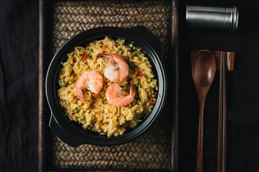 One pot rice dish wooden spoon