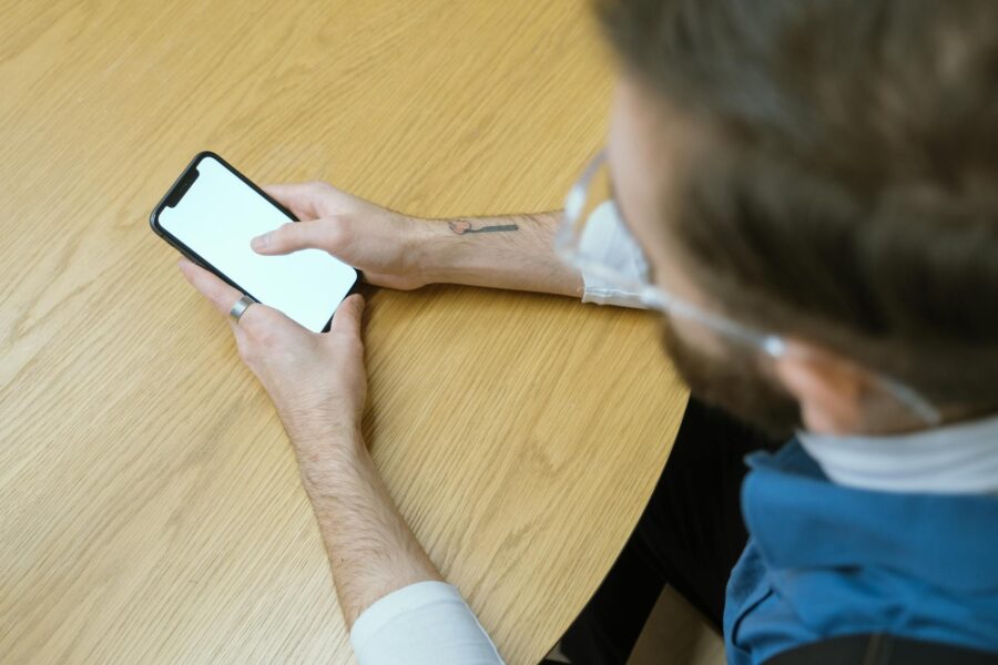 Person putting smartphone