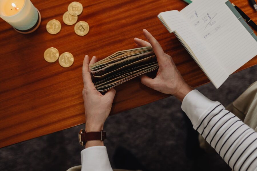 Person organizing cash