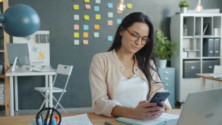 Person using notes app smartphone phone home screen