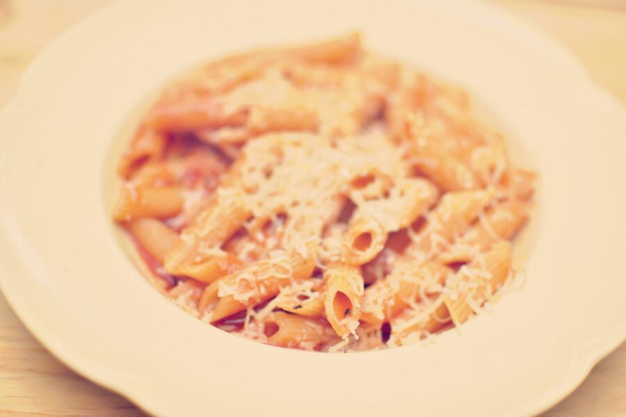 Simple pasta bowl tomato sauce grated cheese