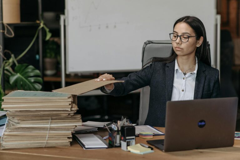 Person organizing files laptop cloud folders