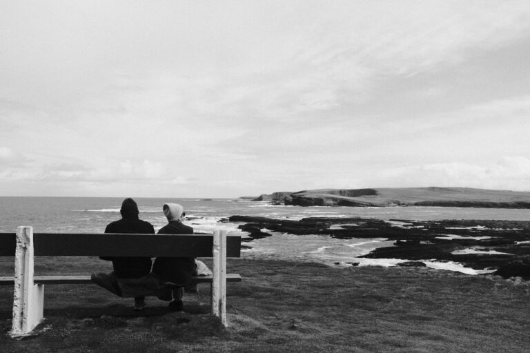 Couple sitting bench