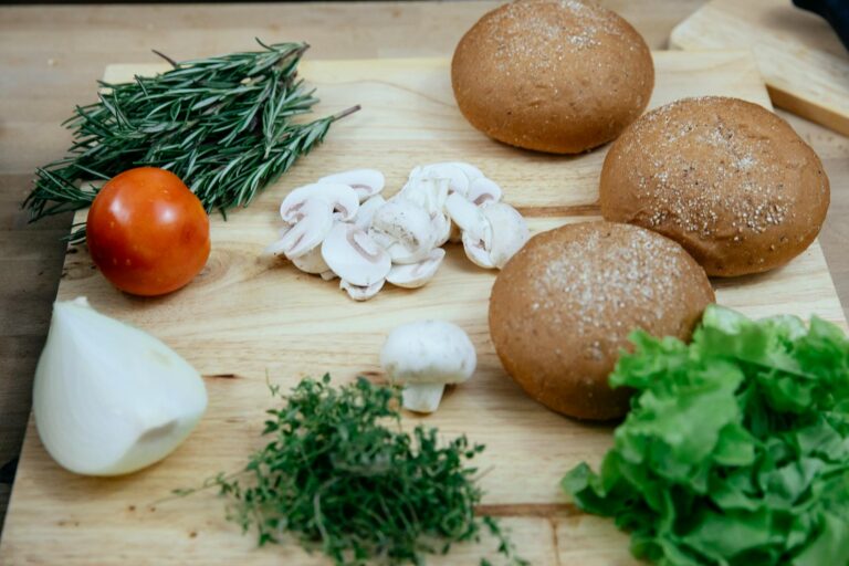 Lentil stew bowl bread chopped vegetables cutting board