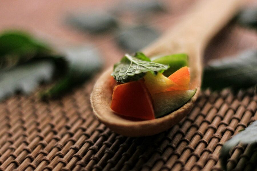 Lentil vegetable stew pot wooden spoon