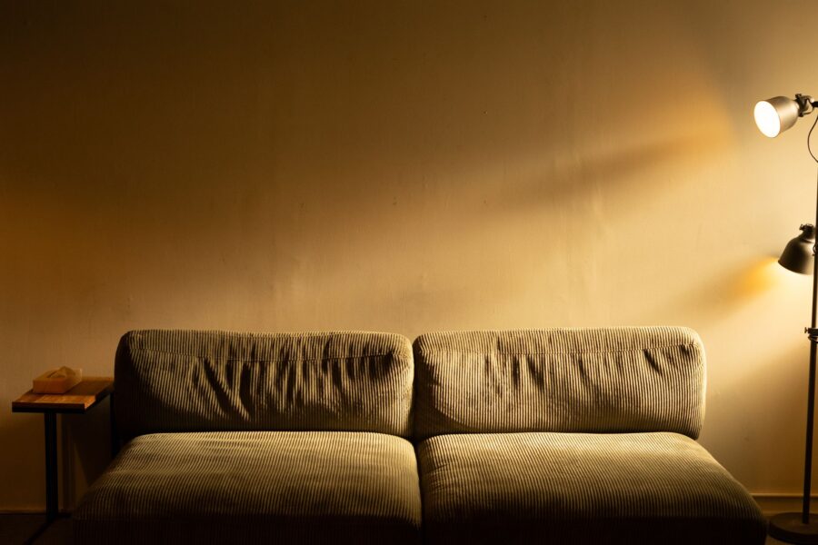 Cozy living room floor lamp warm lighting sofa