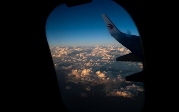Simple ways to cut your holiday flight emissions without stopping travel