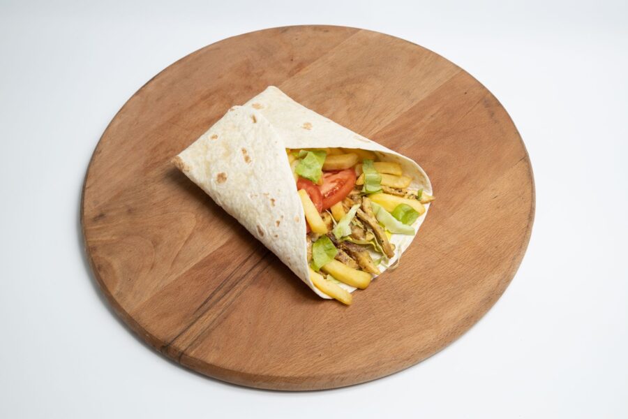Simple tortilla wrap wooden board vegetables
