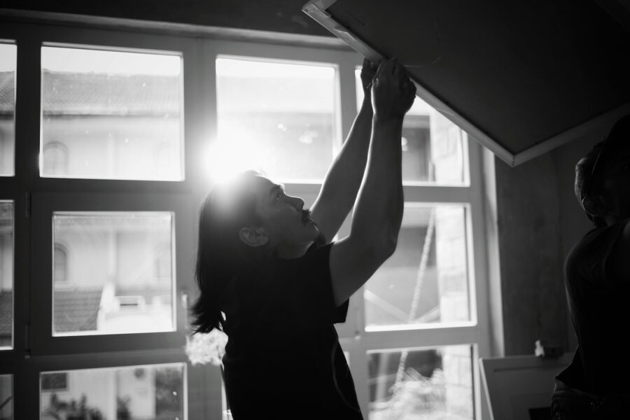 Person stretching window