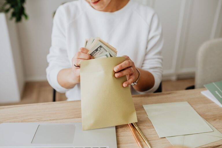 Person dividing money
