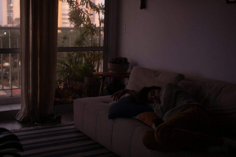 Person relaxing sofa