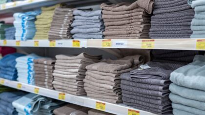 Simple linen closet refresh that keeps towels and sheets neat and easy to grab