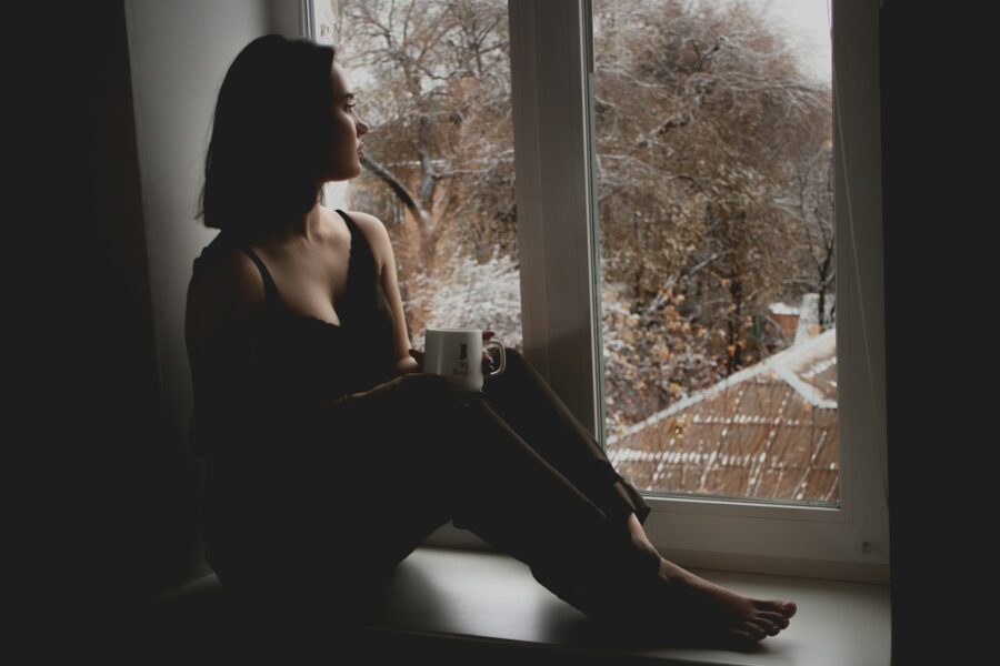 Woman sitting window