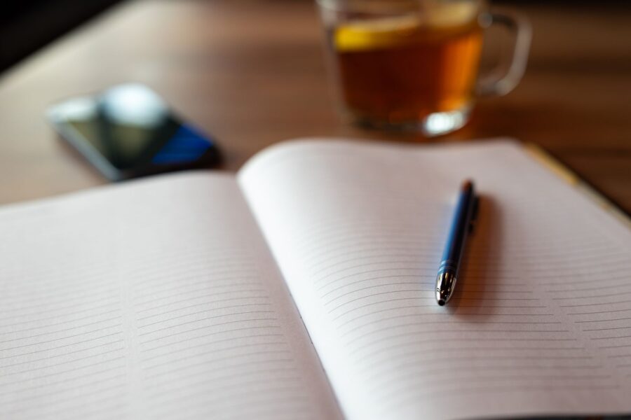 Notebook pen coffee