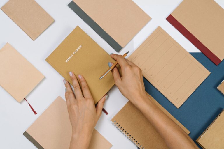 Person writing weekly